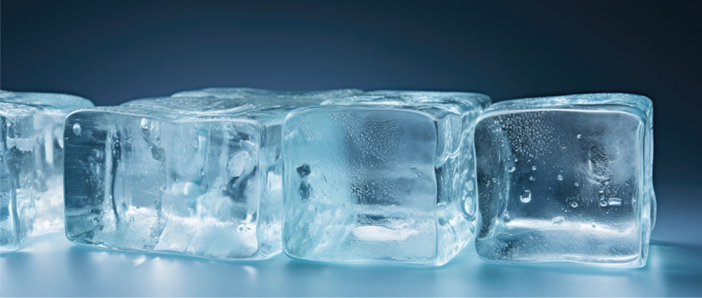 Transparent ice blocks aligned on a cold surface, symbolizing a technology freeze and stalled innovation